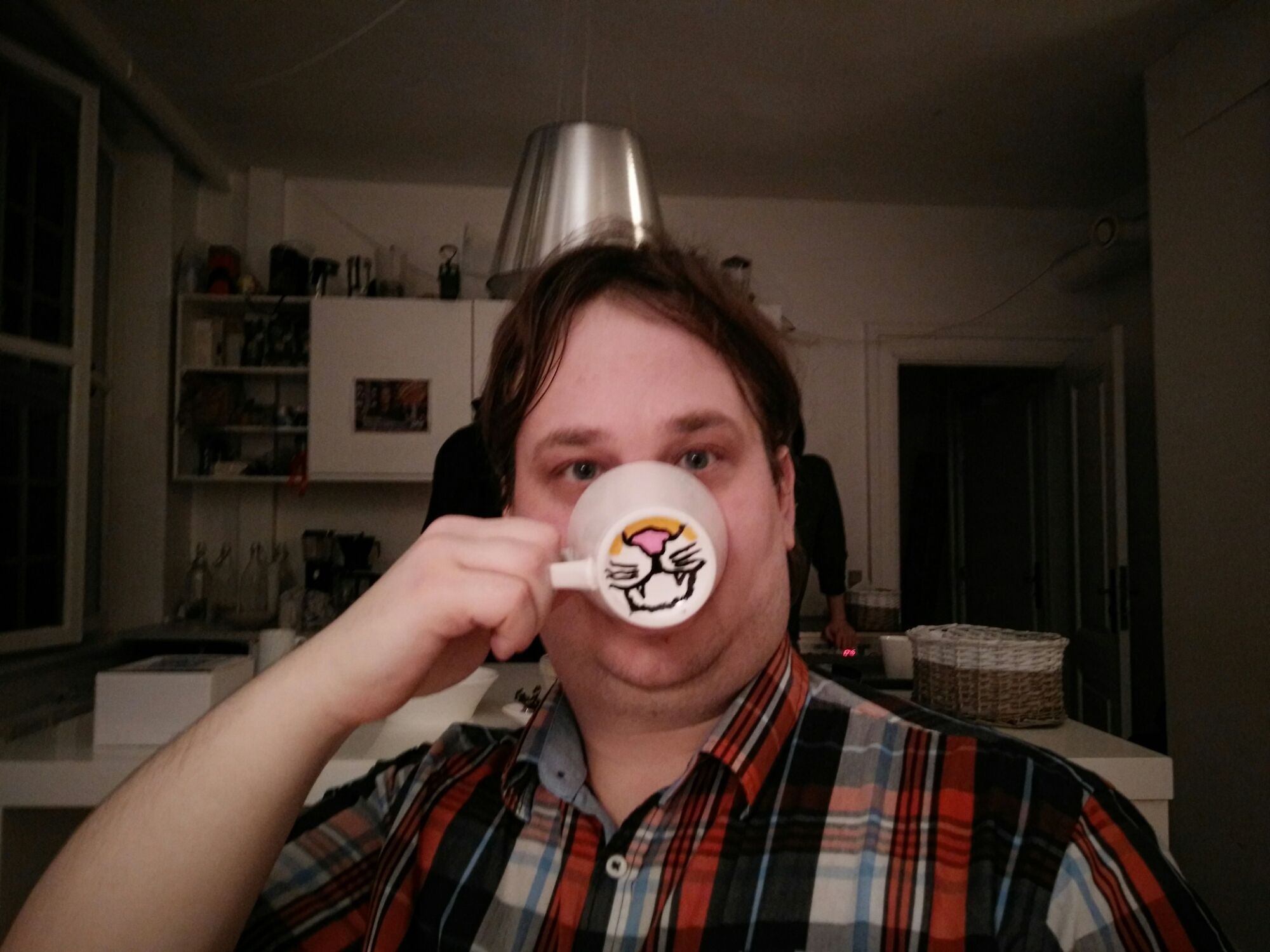 The first photo in my photo blog! Me pretending to drink from a mug I just painted.